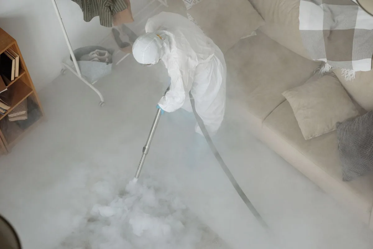 Biohazard cleanup technician in protective equipment, Kenmore, WA